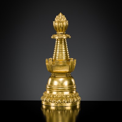 Lot 279 - AN EXCEPTIONAL AND RARE GILT BRONZE STUPA, TIBET, 14TH-15TH CENTURY