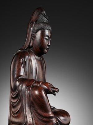 Lot 354 - A RARE ZITAN FIGURE OF GUANYIN, 18TH-19TH CENTURY