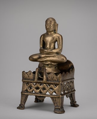 Lot 2147 - A JAIN BRONZE FIGURE OF JINA AND A THRONE, 19th CENTURY