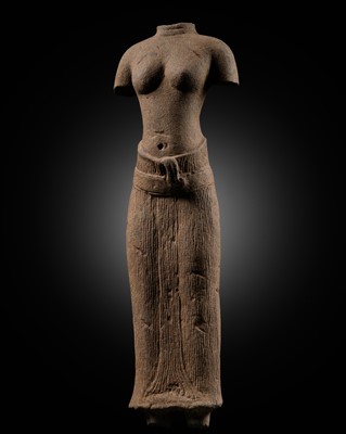 Lot 404 - A SANDSTONE TORSO OF UMA, ANGKOR PERIOD, BAPHUON STYLE, 11TH CENTURY