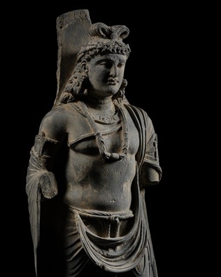 Lot 389 - A LARGE AND IMPORTANT GRAY SCHIST FIGURE OF MAITREYA, ANCIENT REGION OF GANDHARA