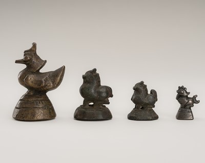 Lot 1083 - A GROUP OF FOUR MIXED METAL OPIUM WEIGHTS, 19TH CENTURY