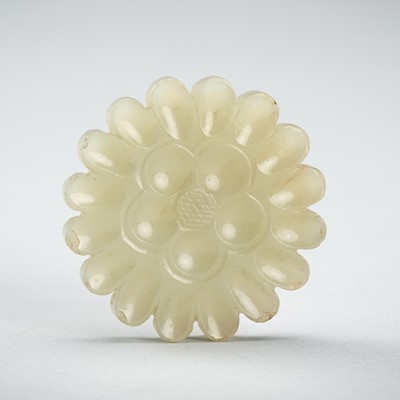 A PALE CELADON JADE ‘FLORAL’ PENDANT, YUAN TO MING DYNASTY