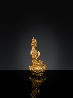 Lot 62 - A GILT-BRONZE FIGURE OF SHADAKSHARI AVALOKITESHVARA, ZANABAZAR SCHOOL