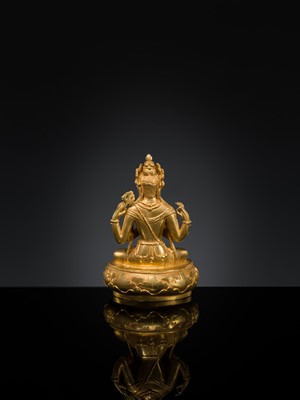 Lot 62 - A GILT-BRONZE FIGURE OF SHADAKSHARI AVALOKITESHVARA, ZANABAZAR SCHOOL