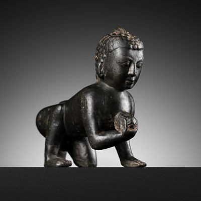 Lot 9 - A BLACK STONE CARVING OF GOPALA KRISHNA, NEPAL, 6TH-7TH CENTURY