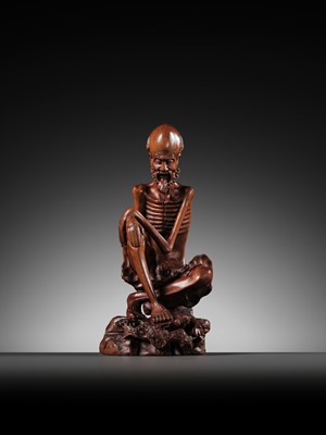 Lot 355 - A BOXWOOD FIGURE OF AN EMACIATED LUOHAN, QING DYNASTY