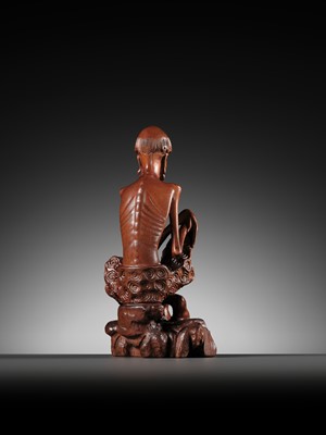 Lot 355 - A BOXWOOD FIGURE OF AN EMACIATED LUOHAN, QING DYNASTY