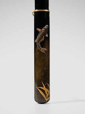 Lot 70 - A SUPERB GOLD AND BLACK LACQUER KISERUZUTSU (PIPE CASE) WITH A CARP