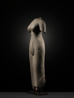 Lot 233 - AN IMPORTANT AND VERY RARE GRAY SANDSTONE TORSO OF UMA, PRASAT ANDET STYLE, PRE-ANGKOR, LATE 7TH CENTURY