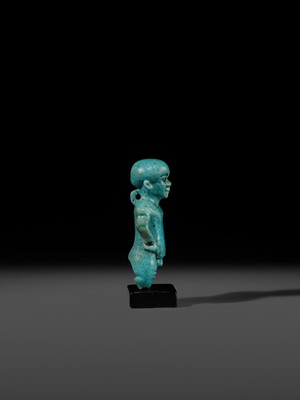Lot 45 - A TURQUOISE-GLAZED FAIENCE AMULET OF PATAIKOS, LATE PERIOD