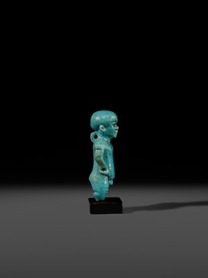 Lot 45 - A TURQUOISE-GLAZED FAIENCE AMULET OF PATAIKOS, LATE PERIOD