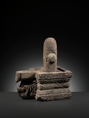 Lot 225 - A RARE ANDESITE LINGA AND YONI, MAJAPAHIT EMPIRE, DATED 1372