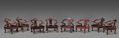 A SET OF EIGHT ROSEWOOD HORSESHOE-BACK ARMCHAIRS, QUANYI, 1900s