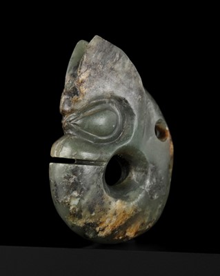 Lot 428 - A GREEN JADE ‘PIG-DRAGON’ PENDANT, ZHULONG, HONGSHAN CULTURE