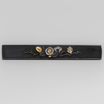 Lot 1582 - A SHAKUDO KOZUKA WITH PEONIES ON A LEAFY BRANCH