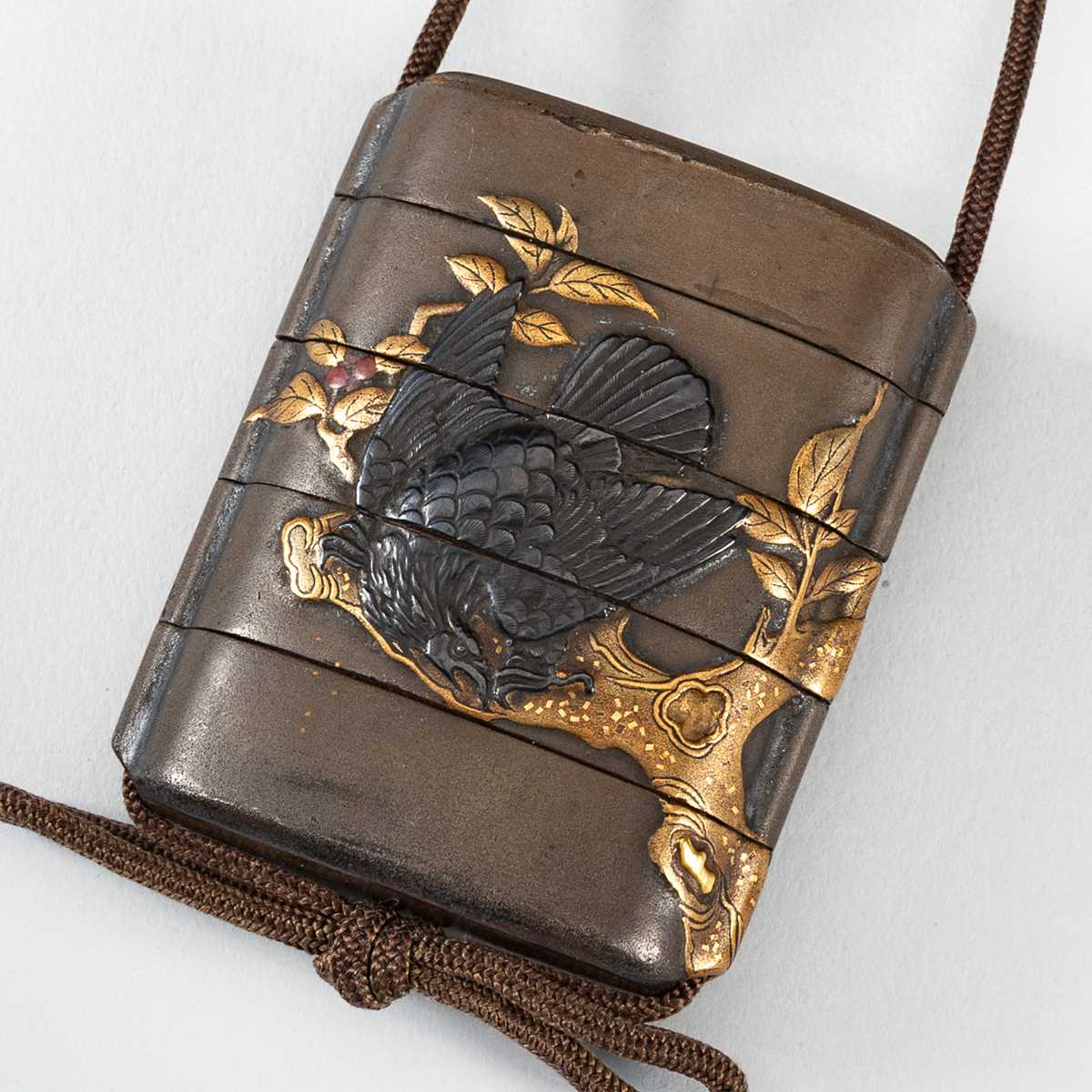 Lot 1432 - A FOUR-CASE LACQUER INRO DEPICTING TWO EAGLES