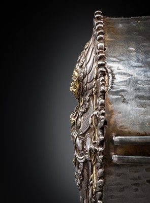Lot 308 - A PARCEL-GILT SILVER REPOUSSÉ GAU DEPICTING SHADBHUJA MAHAKALA, BHUTAN, 19TH CENTURY