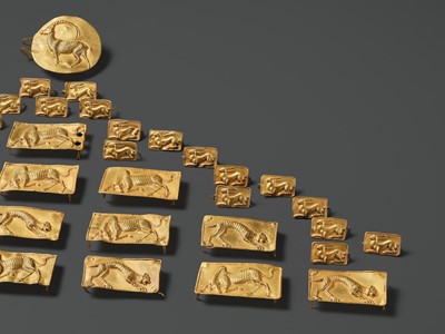 Lot 83 - A COMPLETE BELT SET OF FORTY-FOUR GOLD REPOUSSÉ PLAQUES, ACHAEMENID EMPIRE, PERSIA, 7TH-5TH CENTURY BC