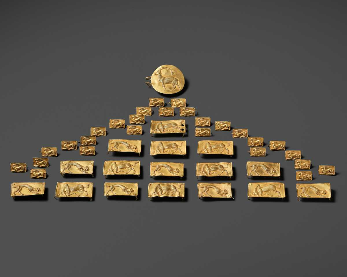 Lot 83 - A COMPLETE BELT SET OF FORTY-FOUR GOLD REPOUSSÉ PLAQUES, ACHAEMENID EMPIRE, PERSIA, 7TH-5TH CENTURY BC