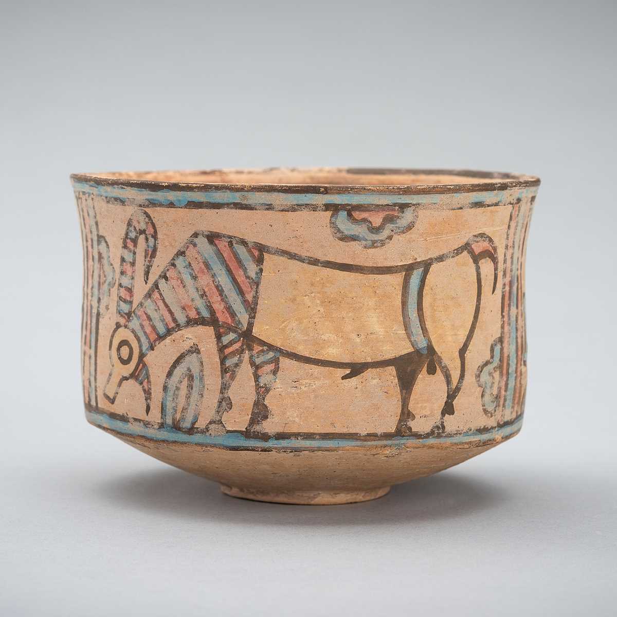 Lot 1256 - A MEHRGARH CERAMIC ‘IBEX AND LION’ BOWL, C. 3000 - 2500 BC