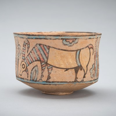 Lot 1256 - A MEHRGARH CERAMIC ‘IBEX AND LION’ BOWL, C. 3000 - 2500 BC