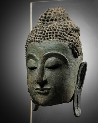 Lot 691 - A BRONZE HEAD FRAGMENT OF BUDDHA, SUKHOTHAI STYLE, AYUTTHAYA PERIOD