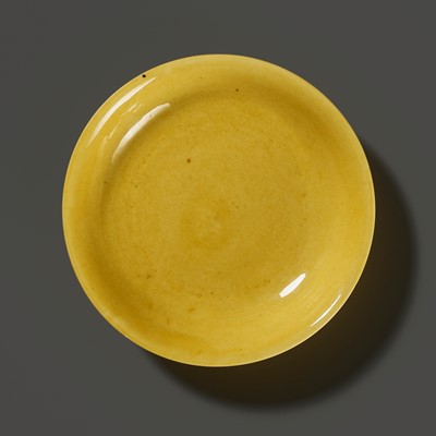 Lot 149 - A SMALL IMPERIAL YELLOW-GLAZED DISH, JIAJING MARK AND PERIOD, 1521-1567