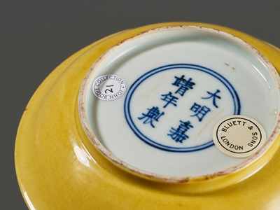 Lot 149 - A SMALL IMPERIAL YELLOW-GLAZED DISH, JIAJING MARK AND PERIOD, 1521-1567
