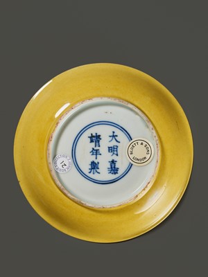 Lot 149 - A SMALL IMPERIAL YELLOW-GLAZED DISH, JIAJING MARK AND PERIOD, 1521-1567