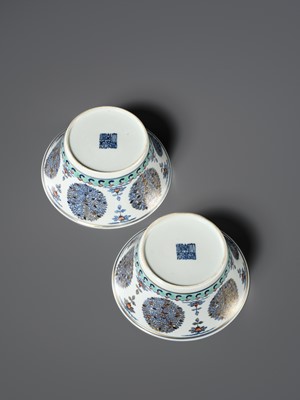 Lot 166 - A RARE PAIR OF DOUCAI ‘MEDALLION’ BOWLS, JIAQING MARKS AND OF THE PERIOD, WITH MATCHING IMPERIAL LACQUER STANDS