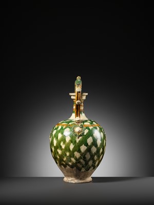 Lot 137 - A SANCAI-GLAZED APPLIQUÉ-DECORATED DRAGON-HANDLED AMPHORA, TANG DYNASTY