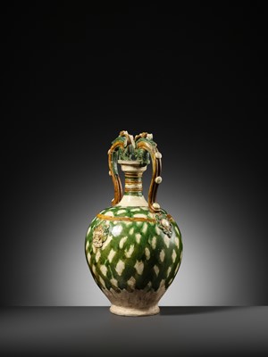 Lot 137 - A SANCAI-GLAZED APPLIQUÉ-DECORATED DRAGON-HANDLED AMPHORA, TANG DYNASTY