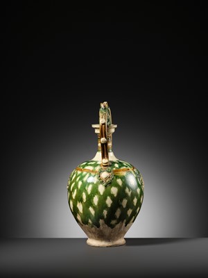 Lot 137 - A SANCAI-GLAZED APPLIQUÉ-DECORATED DRAGON-HANDLED AMPHORA, TANG DYNASTY
