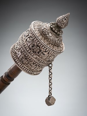 Lot 1460 - A SILVERED PRAYER WHEEL, MANI, LATE 19TH CENTURY