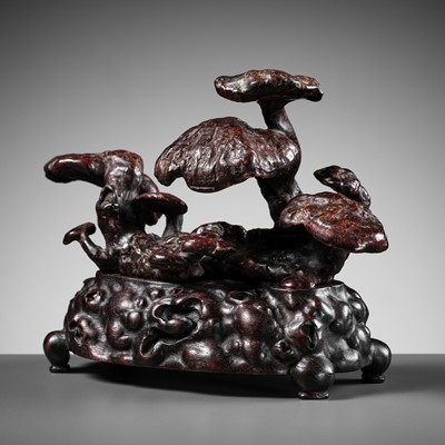 Lot 413 - A LACQUERED CLUSTER OF LINGZHI FUNGUS WITH MATCHING ZITAN STAND, QING DYNASTY