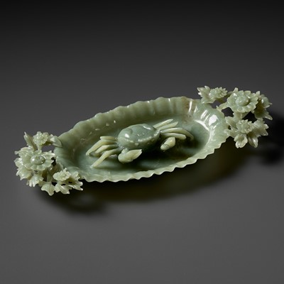 Lot 474 - A PALE GREEN JADEITE ‘CRAB AND CHRYSANTHEMUM’ BRUSH WASHER, LATE QING DYNASTY