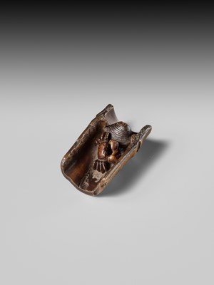 Lot 172 - HOKUTEI: A WOOD NETSUKE OF A CRAB AND A CLAM IN A SEGMENT OF BAMBOO