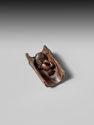 Lot 172 - HOKUTEI: A WOOD NETSUKE OF A CRAB AND A CLAM IN A SEGMENT OF BAMBOO