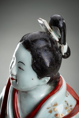 Lot 195 - AN IMARI PORCELAIN FIGURE OF A BIJIN