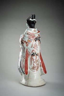 Lot 195 - AN IMARI PORCELAIN FIGURE OF A BIJIN