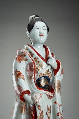 Lot 195 - AN IMARI PORCELAIN FIGURE OF A BIJIN