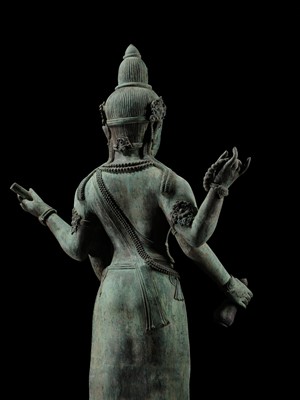 Lot 38 - A COLOSSAL (3.5 METERS HIGH) BRONZE STATUE OF AVALOKITESHVARA, SRIVIJAYA KINGDOM STYLE, CIRCA 18TH-19TH CENTURY OR EARLIER