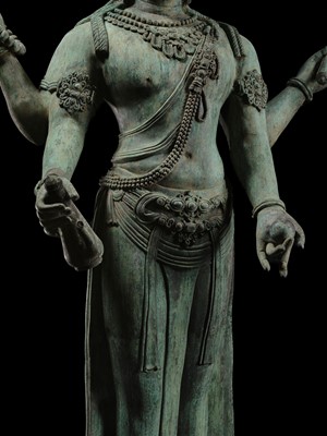 Lot 38 - A COLOSSAL (3.5 METERS HIGH) BRONZE STATUE OF AVALOKITESHVARA, SRIVIJAYA KINGDOM STYLE, CIRCA 18TH-19TH CENTURY OR EARLIER