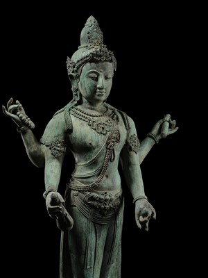 Lot 38 - A COLOSSAL (3.5 METERS HIGH) BRONZE STATUE OF AVALOKITESHVARA, SRIVIJAYA KINGDOM STYLE, CIRCA 18TH-19TH CENTURY OR EARLIER