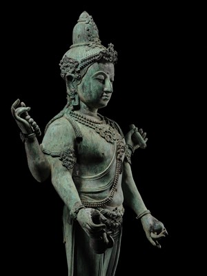 Lot 38 - A COLOSSAL (3.5 METERS HIGH) BRONZE STATUE OF AVALOKITESHVARA, SRIVIJAYA KINGDOM STYLE, CIRCA 18TH-19TH CENTURY OR EARLIER