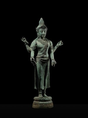 Lot 38 - A COLOSSAL (3.5 METERS HIGH) BRONZE STATUE OF AVALOKITESHVARA, SRIVIJAYA KINGDOM STYLE, CIRCA 18TH-19TH CENTURY OR EARLIER