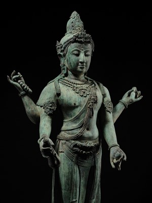 Lot 38 - A COLOSSAL (3.5 METERS HIGH) BRONZE STATUE OF AVALOKITESHVARA, SRIVIJAYA KINGDOM STYLE, CIRCA 18TH-19TH CENTURY OR EARLIER