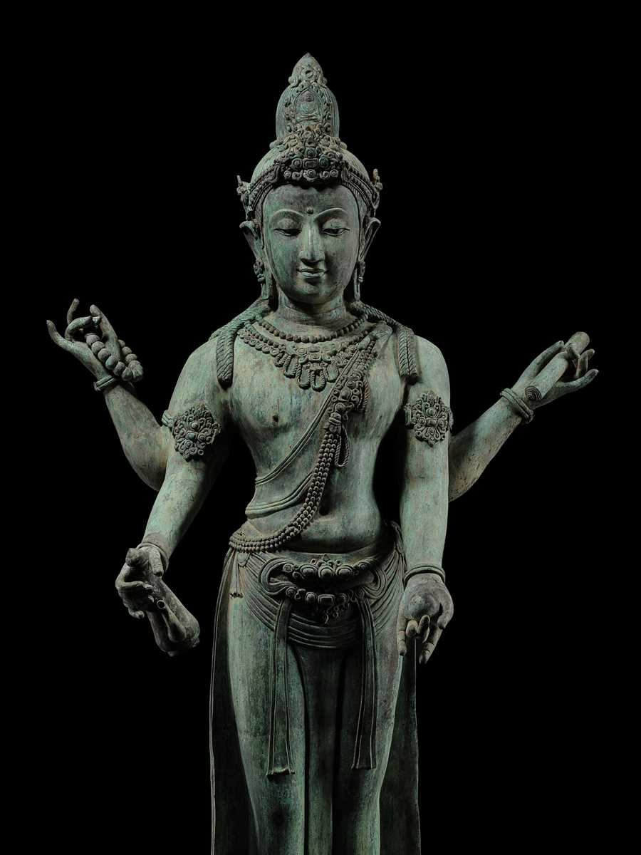 Lot 38 - A COLOSSAL (3.5 METERS HIGH) BRONZE STATUE OF AVALOKITESHVARA, SRIVIJAYA KINGDOM STYLE, CIRCA 18TH-19TH CENTURY OR EARLIER