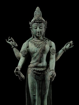 Lot 38 - A COLOSSAL (3.5 METERS HIGH) BRONZE STATUE OF AVALOKITESHVARA, SRIVIJAYA KINGDOM STYLE, CIRCA 18TH-19TH CENTURY OR EARLIER